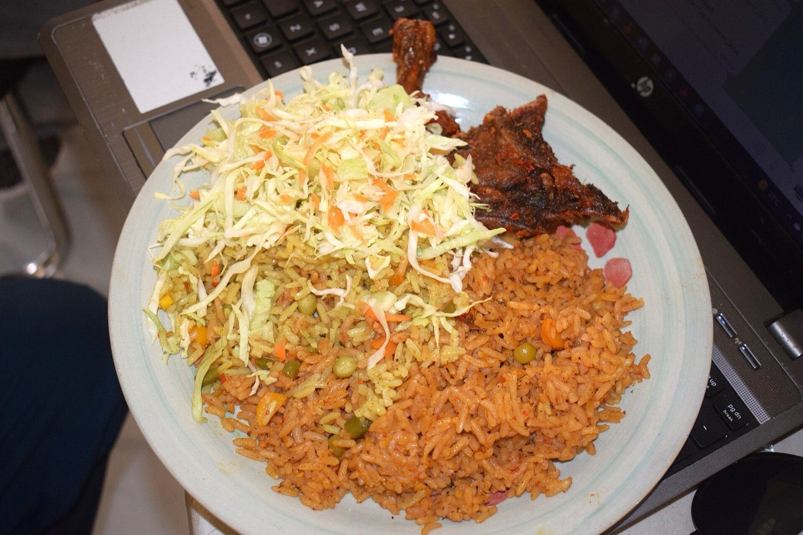 A large pan of Nigerian jollof rice.