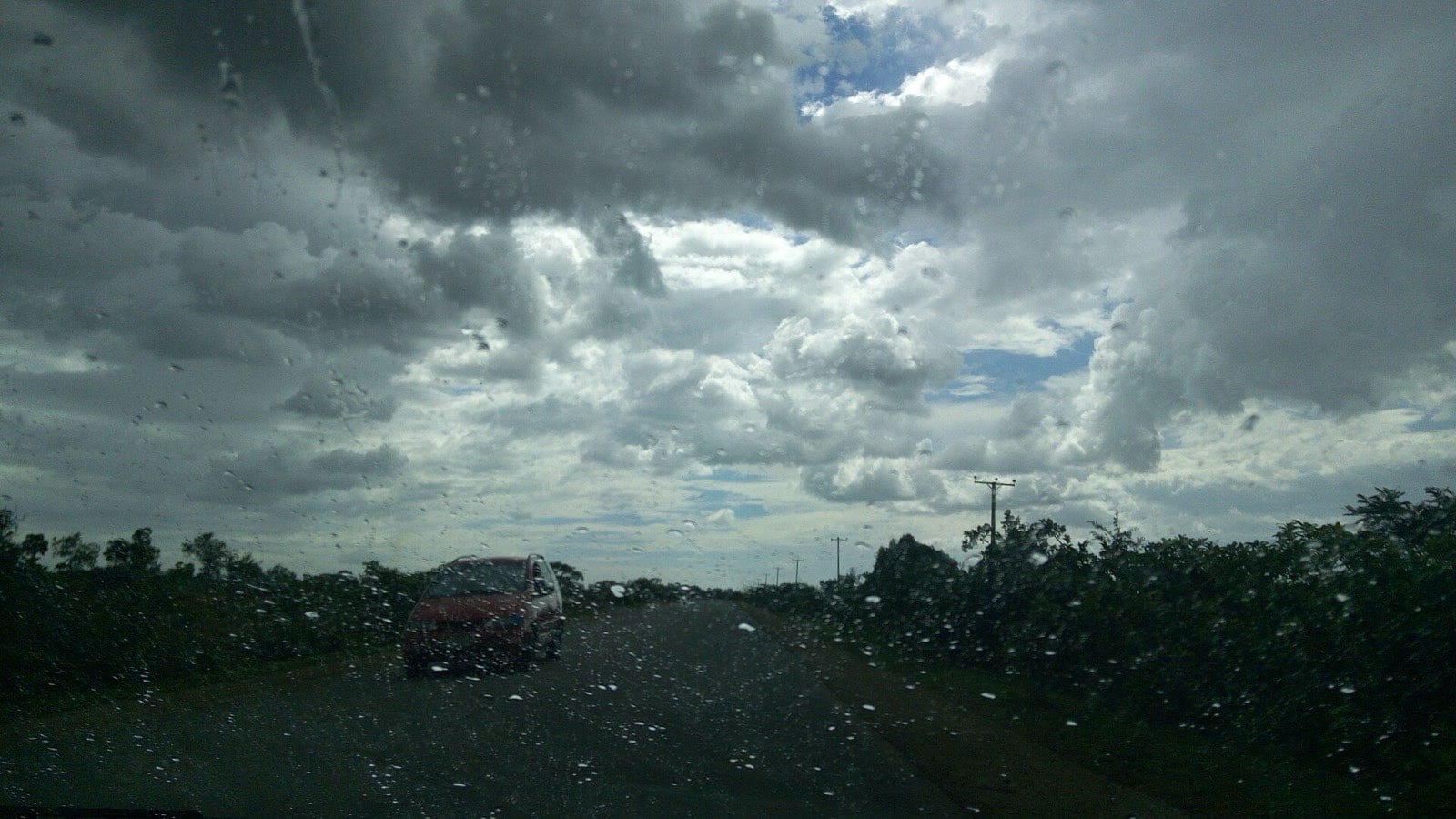 Open plains on the Plateau under a tall cloud formation.